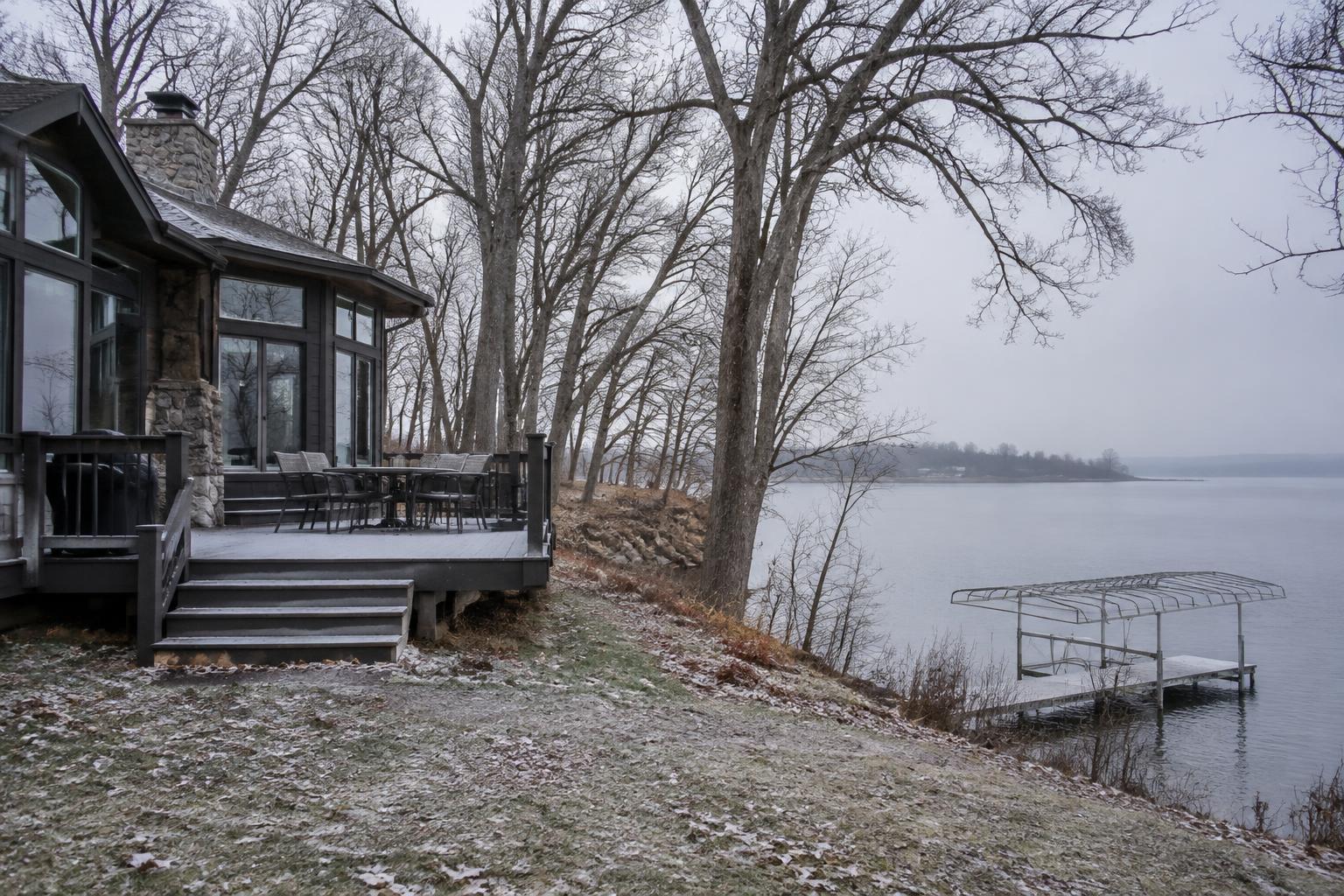 Lake house deck and dock shut down for winter on an overcast Missouri day